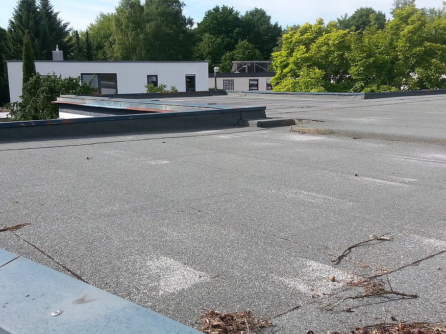 A Guide to Reroofing Your Flat Roof
